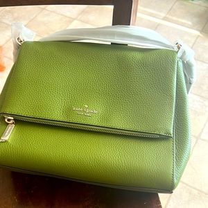 Kate spade green flap purse with matching wallet. Still has tags never used